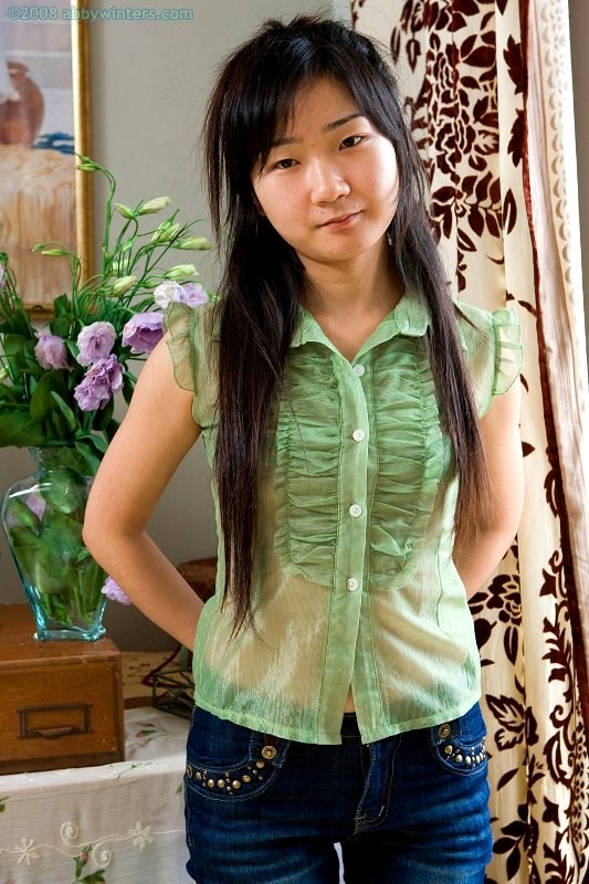 Downblouse scene with pretty Asian chick in blue dress